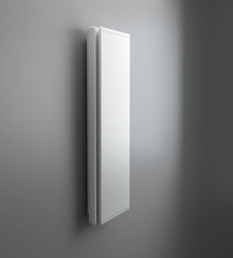 A sleek white vertical radiator hangs on a minimalist grey wall, showcasing a modern and slim design.